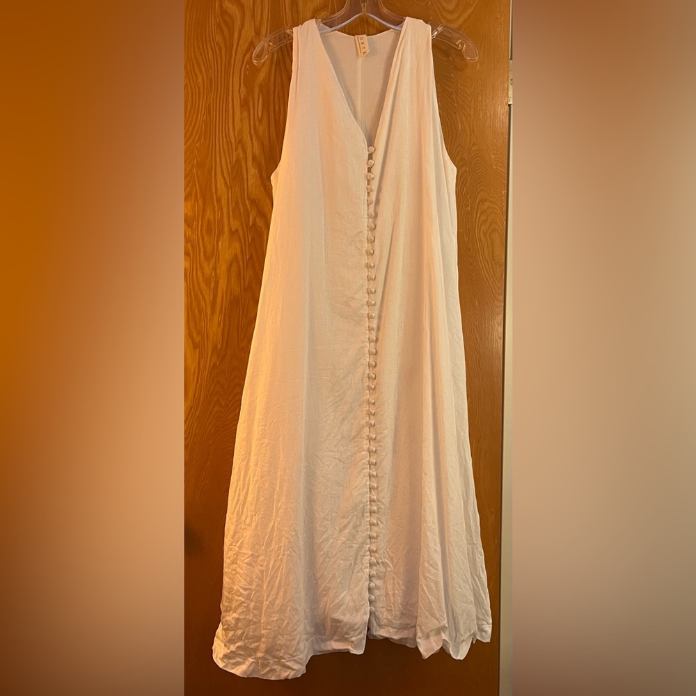 Norte Women sleeveless white maxi linen dress with multiple buttons in front
